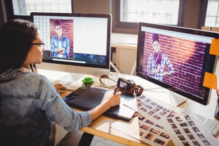 Photo for View of Graphic designer using graphics tablet - Royalty Free Image
