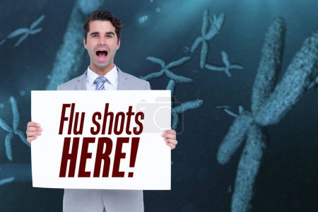 Photo for Businessman holding flu shots here sign - Royalty Free Image