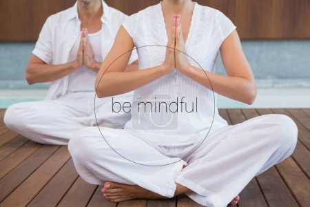 Photo for Couple performing yoga close up - Royalty Free Image