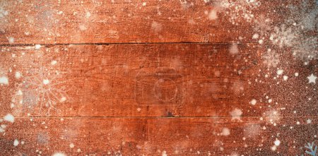 Photo for Composite image of wooden surface with snowflakes - Royalty Free Image