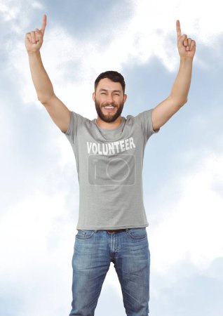 Photo for Rising hands volunteer against sky background - Royalty Free Image