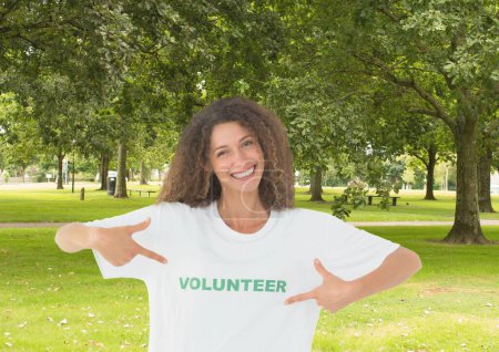 Photo for Smiling volunteer against park background - Royalty Free Image