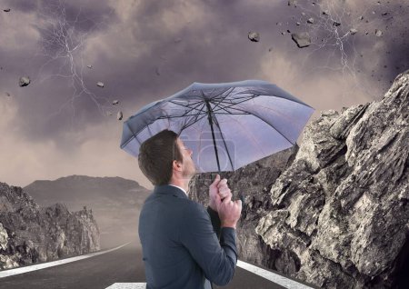 Photo for Digital composite of man with umbrella - Royalty Free Image