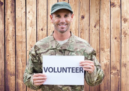 Photo for Military with sign volunteer - Royalty Free Image