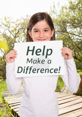 Photo for Smiling Girl with sign help make a difference - Royalty Free Image