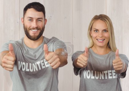 Photo for Couple of volunteers thumbs up - Royalty Free Image
