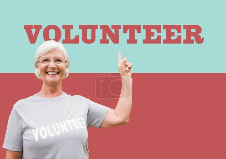 Photo for Old woman pointing word volunteer - Royalty Free Image