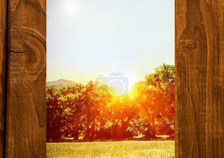 Photo for Wooden fence in front of sunrise - Royalty Free Image