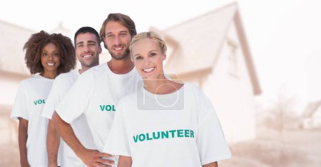 Téléchargez les photos : Composite numérique de bénévoles debout en rangée - en image libre de droit