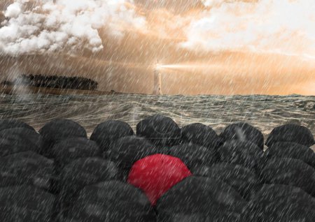 Téléchargez les photos : Parapluie noir et rouge au-dessus de l'océan - en image libre de droit