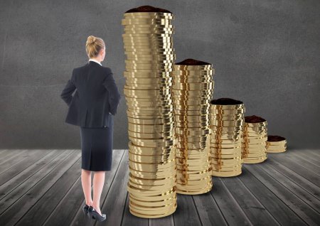 Photo for Woman standing in front of gold coins with columns - Royalty Free Image
