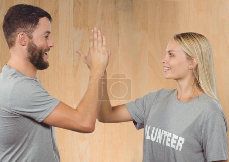 Photo for Digital composite of volunteers high five - Royalty Free Image