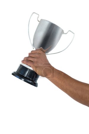 Photo for Hand of businessman holding trophy on white background - Royalty Free Image