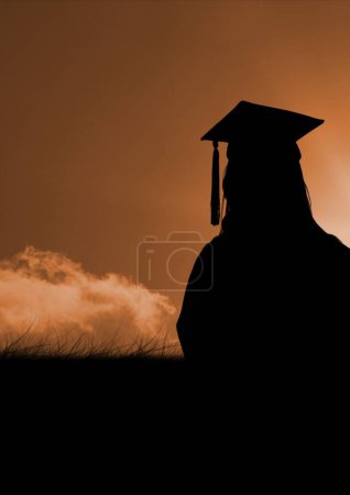 Photo for Graduate student against sunset or sunrise - Royalty Free Image