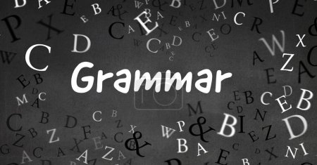 Photo for Grammar text surrounded by floating letters on blackboard - Royalty Free Image