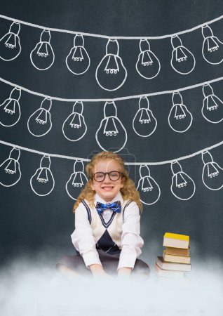 Photo for Happy girl with books sitting on a cloud against blue background against bulbs icons - Royalty Free Image