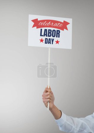 Photo for Business man holding a Labor Day card - Royalty Free Image