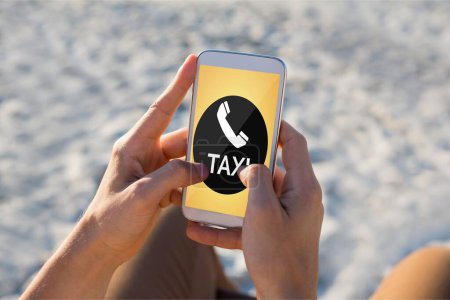 Photo for Person holding a phone with a taxi app - Royalty Free Image