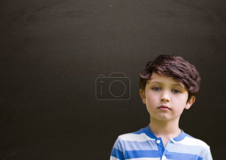 Photo for Blackboard with caucasian little boy - Royalty Free Image
