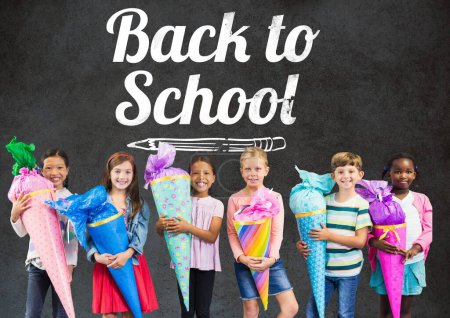 Photo for Back to school text on blackboard with school kids - Royalty Free Image
