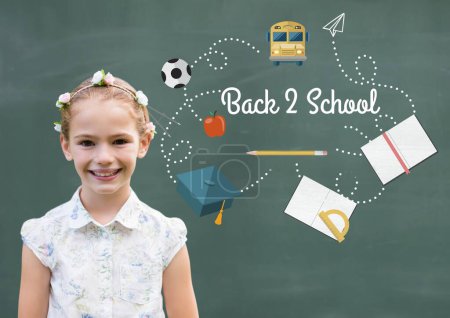 Photo for Girl standing and Back 2 school graphics on blackboard - Royalty Free Image