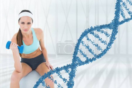 Photo for Fitness woman lifting weight with 3D DNA strand - Royalty Free Image