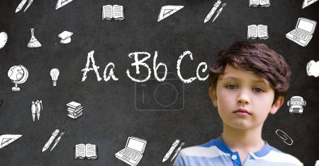 Photo for Boy and Letter learning text with education drawings icons on blackboard - Royalty Free Image