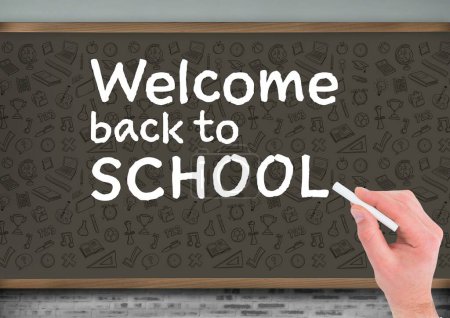 Photo for Hand writing with chalk Welcome back to school with education graphics on blackboard - Royalty Free Image