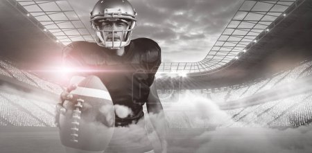 Photo for American football player with helmet at stadium - Royalty Free Image