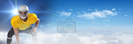 Photo for "American football player with sky transition" - Royalty Free Image
