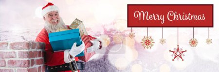 Photo for Merry Christmas text and Santa with gifts - Royalty Free Image