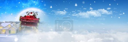 Téléchargez les photos : Ciel d'hiver avec Père Noël traîneau et rennes - en image libre de droit