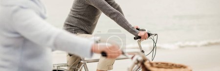 Photo for "Senior couple having ride with their bike" - Royalty Free Image