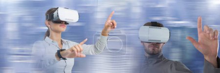 Photo for Man and woman wearing virtual reality headset glasses with motion effects transition - Royalty Free Image