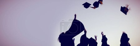 Photo for Five graduates throwing their hats - Royalty Free Image