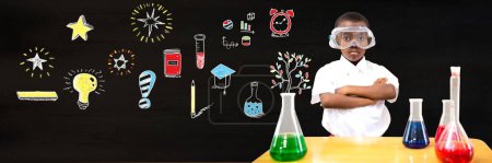 Photo for School boy scientist and Education drawing on blackboard for school - Royalty Free Image