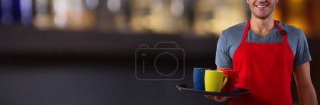 Photo for Composite image of male waiter holding tray with coffee mug - Royalty Free Image