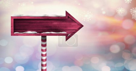 Photo for Christmas arrow sign with snow - Royalty Free Image