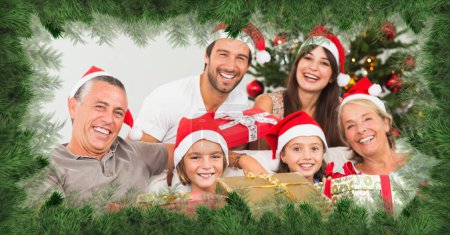 Photo for Christmas tree border and happy family get together - Royalty Free Image