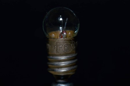 Photo for Small lamp on a black background - Royalty Free Image