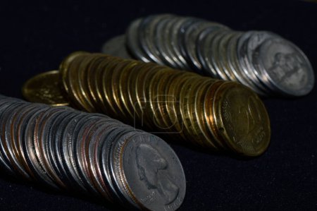 Photo for Stacks of coins lie in a row - Royalty Free Image