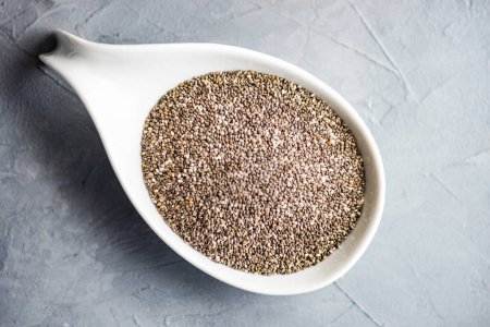 Photo for Close-up shot of fresh organic flax seeds on tabletop for background - Royalty Free Image