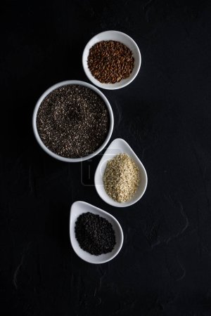 Photo for Close-up shot of fresh organic seeds on tabletop for background - Royalty Free Image