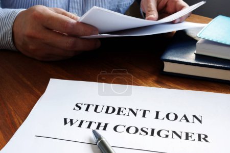 Foto de Student loans with cosigner application form and pen. - Imagen libre de derechos