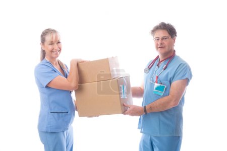 Photo for Medical healthcare workers holding a delivery of PPE or equipmen - Royalty Free Image