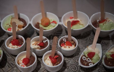 Photo for Close up view of delicious ice creams in bowls - Royalty Free Image