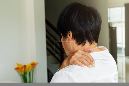 Photo for Neck and shoulder pain, old woman suffering from neck and should - Royalty Free Image