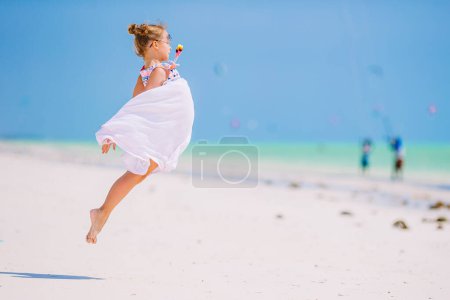 Photo for Portrait of adorable little girl at beach during summer vacation - Royalty Free Image