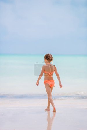 Photo for Happy girl enjoy summer vacation on the beach - Royalty Free Image