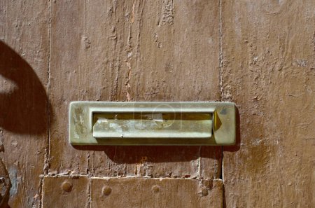 Photo for Old letterbox in the door, traditional way of delivering letters - Royalty Free Image